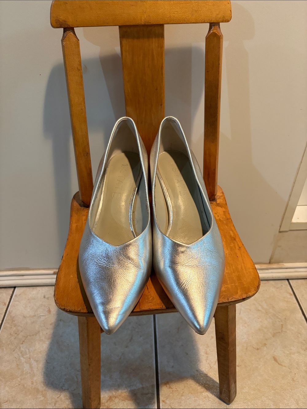 1. State Metallic Silver Pointed-Toe heels
